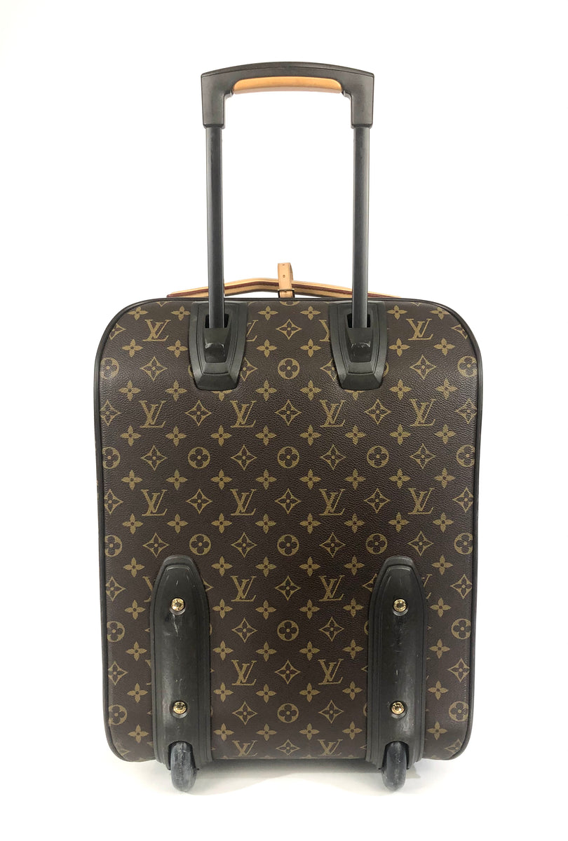 A monogram printed leather Pegase 45 cabin bag by Louis Vuitton. -  Bukowskis
