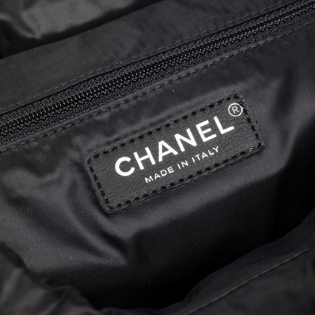 Chanel  Coco Niege Ecru Wool Black Nylon Quilted Backpack