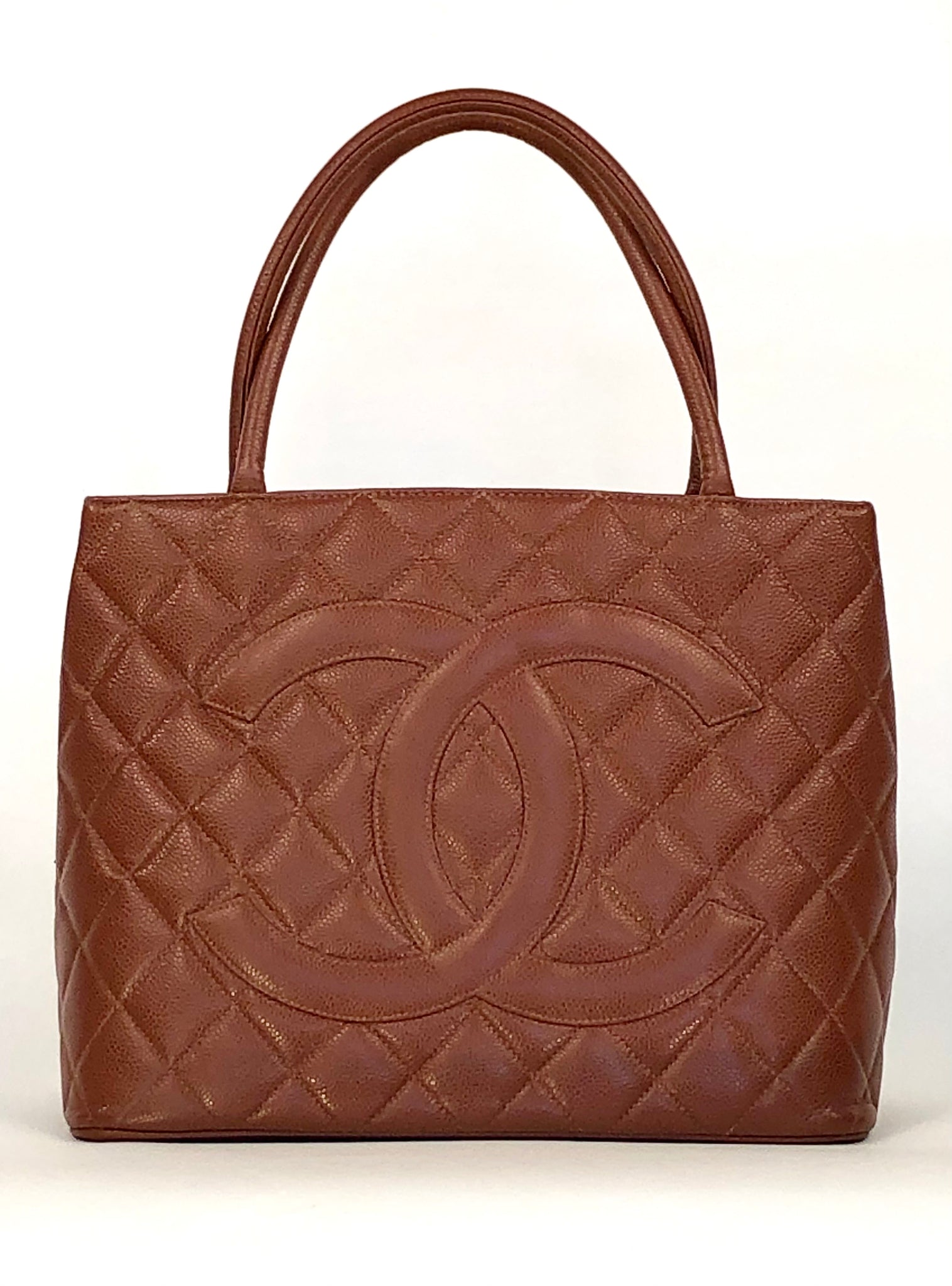 Vintage Medallion Quilted Caviar Leather Handbag