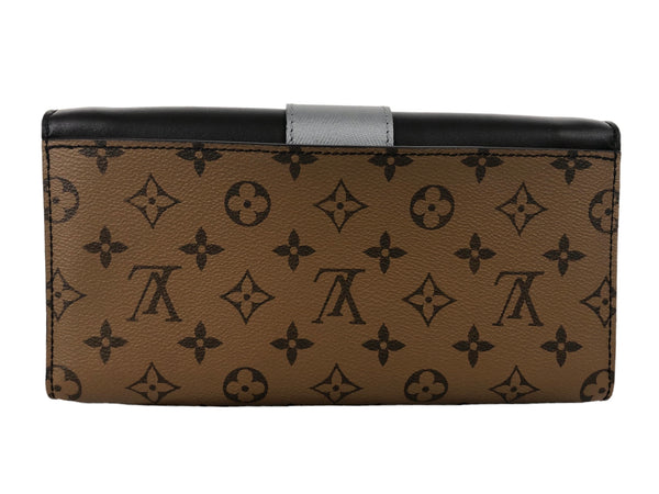 Calfskin Reverse Monogram Column Clutch