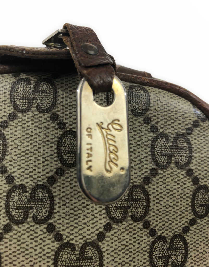 Vintage Gucci Plus brown monogram duffle bag with leather trimming